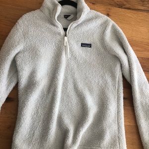 White fur Patagonia quarter zip